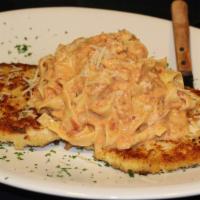 Crusted Chicken Romano · All-natural free-range chicken breast crusted with Romano and Parmesan cheese. Served with f...