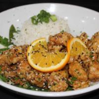 Orange Chicken · All-natural free-range chicken breast pieces, fried and tossed in sweet and sour orange sauc...