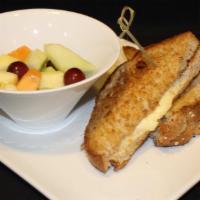 Grilled Cheese Sandwich · American cheese on whole wheat bread. Served with fruit salad.