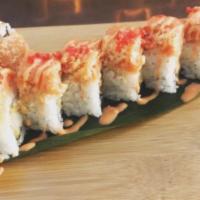 Red Sea Roll · Shrimp tempura, avocado, topped with spicy crunchy tuna, tobiko. Hot and spicy. Disclaimer: ...