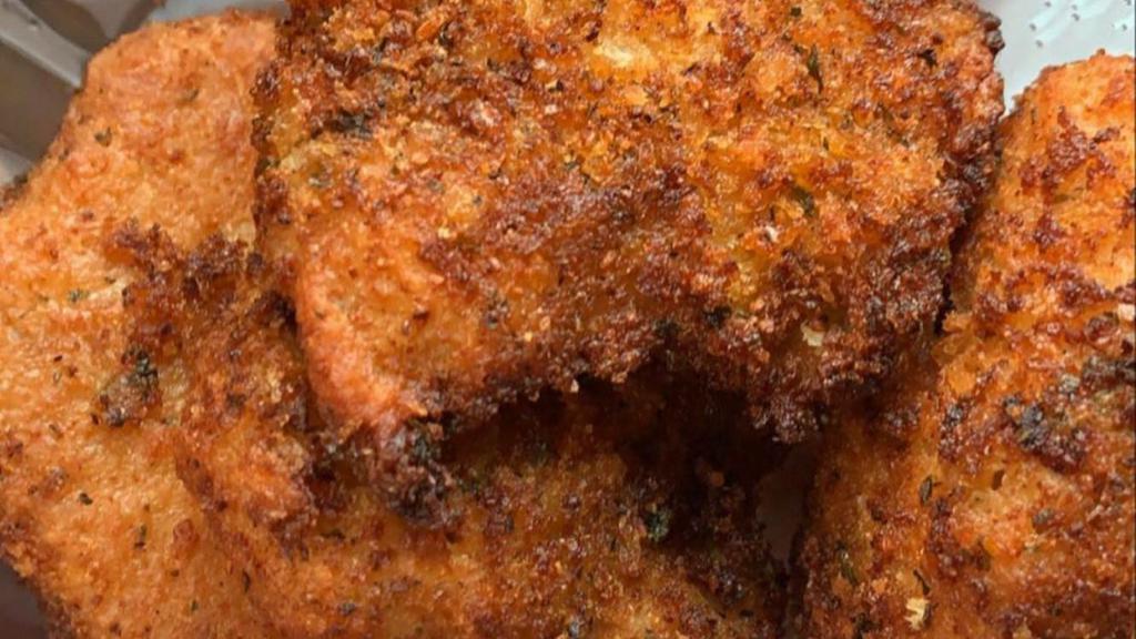 Lemon Crusted Chicken Nuggets · Chef B's famous lemon crusted nuggets! Six fried nuggets. Contains fermented soy.