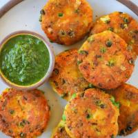 Aloo Tikka Tok · Patties of spiced potatoes stuffed with spicy lentils.