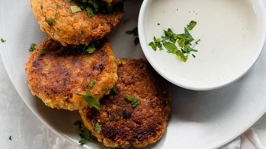 Pakoras Compassion · Chickpea battered fritters.