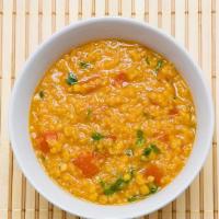 Daal Saag Saagwala · Yellow lentils cooked with fresh spinach and spices.