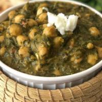 Channa Saag · Chickpeas cooked with fresh spinach.
