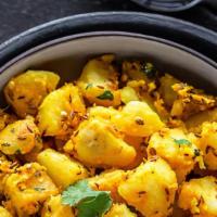 Jeera Aloo Pursue · Potato cooked in homemade style with cumin seeds.