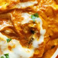 Paneer Makhani Passion · Cubes of cheese cooked in a rich tomato sauce.