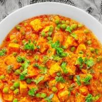 Shahi Mutter Paneer Pioneer · Fresh green peas with cubes of cheese cooked in a rich mild sauce.
