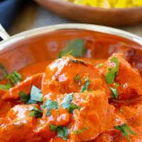 Chicken Tikka Tok Masala · Tandoori cooked chicken cubes finished with a rich tomato based gravy.