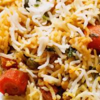 Vegetable Biryani Hyderabadi · Basmati rice cooked with fresh mixed vegetables cumin seeds, curry leaves, mustard seeds, an...
