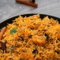 Shrimp Biryani Hyderabadi · Basmati rice with jumbo shrimp with aromatic spices. Served with raita.