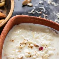 Kheer · Rice with milk, cardamom, saffron, and garnished with nuts.