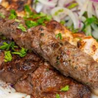 Kofta Kebab · Ground meat with onion and parsley.