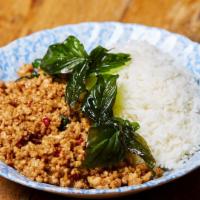 Ground Chicken Basil Over Rice · Ground chicken sautéed with garlic, Thai chili and basil served with jasmine rice.