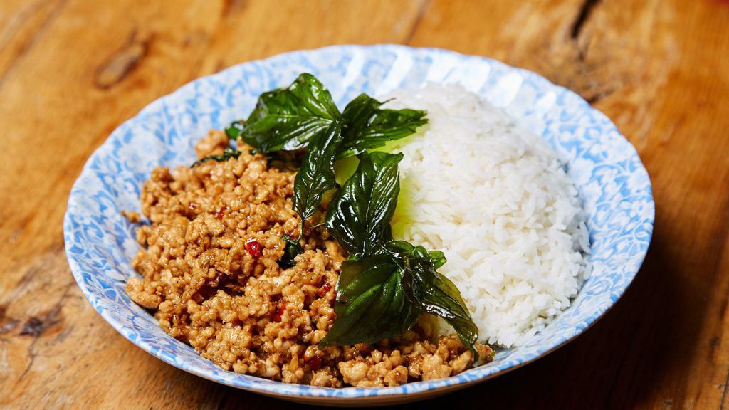 Ground Chicken Basil Over Rice · Ground chicken sautéed with garlic, Thai chili and basil served with jasmine rice.
