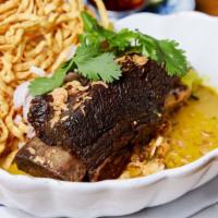 Kao-Soi Short Ribs · Homemade chiangmai yellow curry with braised short ribs, pickle cauliflower and egg noodle.
