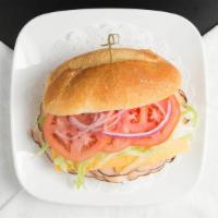 American Turkey · Turkey, American yellow cheese, lettuce, tomato and onions.