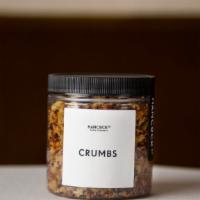 Focaccia Bread Crumbs · 8oz 
House made breadcrumbs made with roasted garlic, shallots, fresh thyme and sea salt. We...