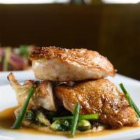 Roasted Amish Chicken · grilled asparagus, cauliflower puree and truffle jus.
