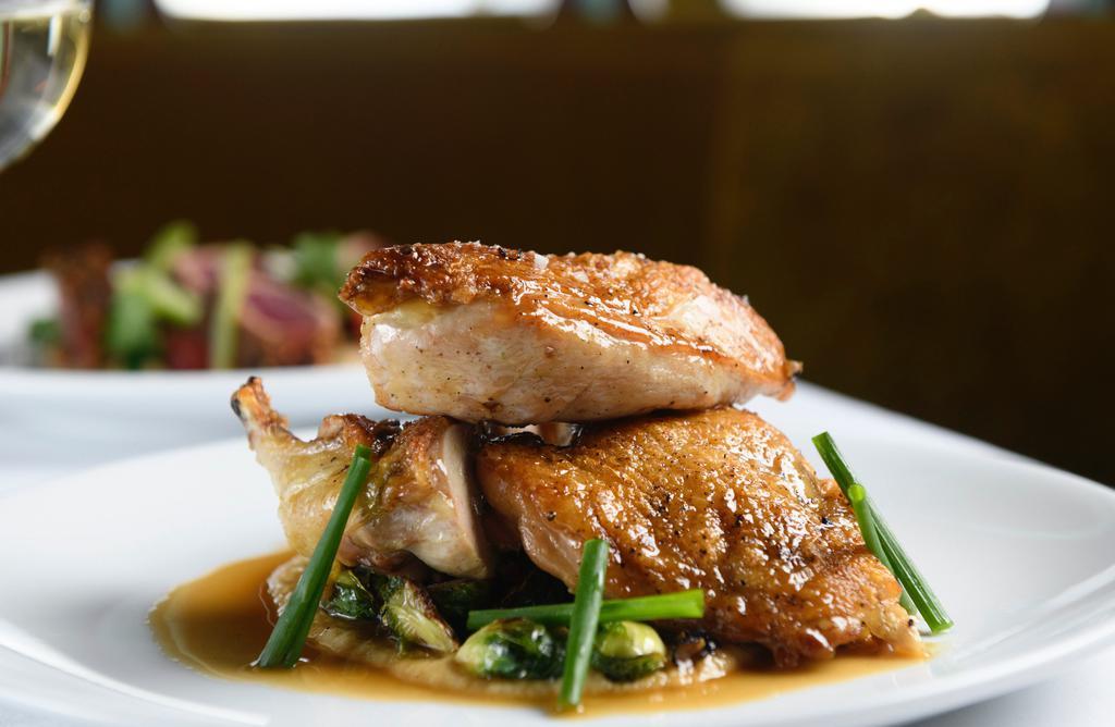 Roasted Amish Chicken · grilled asparagus, cauliflower puree and truffle jus.