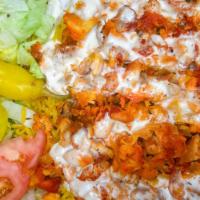 Organic Chicken Over Rice · Served with lettuce and tomato