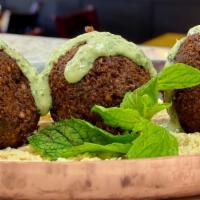 Falafel · It’s the most crispy and yummy falafel you could ever try! Lightly pan-fried chickpeas and v...