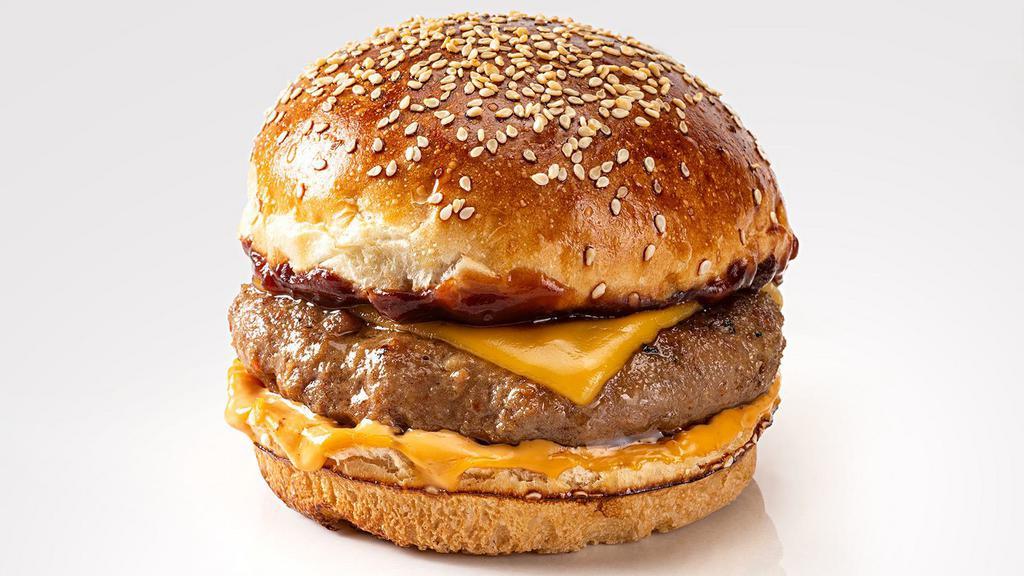 Cheeseburger · Beef 1/3 lb. patty with cheddar cheese, fresh onion, lettuce, tomato, pickle and Halva Sauce.