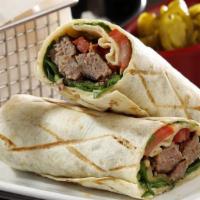 Kofte (Meatball)Wrap · Beef meatballs with Turkish Homemade bread inside of lettuce, onion and tomato.