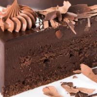 Special Triple Belgian Chocolate Cake Slice · Chocolate cake filled with chocolate cream, hazelnut cream and hazelnut crunch, finished wit...