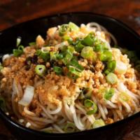 Dan Dan Noodles · Steamed noodles with house special sauce mixed in peanut butter and hot oil.