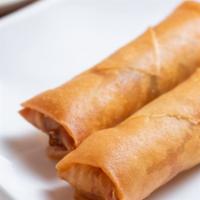 Shanghainese Vegetable Spring Rolls · Two pieces of light skin rolls wrapped with shredded cabbage, carrots, mushrooms, and deep f...