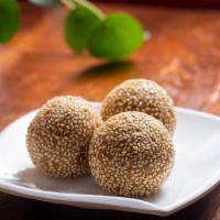 Matcha Sesame Balls Stuffed With Red Bean Paste (3 Pieces) · Sweet wheat starch rice balls with matcha tea flavor deep fried stuffed with red bean paste ...