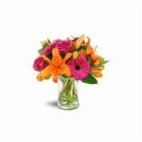 Vibrant Shine™ · Orange Asiatic lilies, got pink roses and gerbera daisies, and orange tulips are arranged wi...