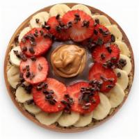 Pb Açaí® · BLENDED: Açaí, peanut butter, banana, plant milk. TOPPINGS: Strawberries, peanut butter, cac...