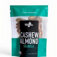 Cashew Almond Granola · Gluten-free rolled oats, maple syrup, raisins, coconut chips, almonds, cashews, sunflower oi...