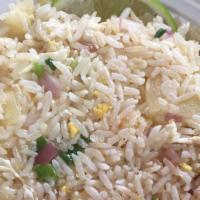 Thai Pineapple Fried Rice · Thai fried with sweet pineapple chunks, cashew nuts, egg, onion, and scallion.