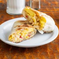 Classic Breakfast Wrap · Delicious Breakfast Wrap made with 2 Eggs, ham, cheese, and home fries.