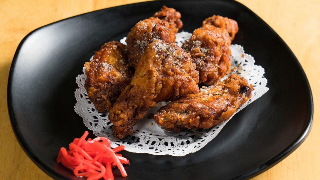 Yama Wings · 5 pieces. Marinated fried chicken wings with soy and topped with sesame pepper.