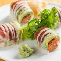 Crazy Maguro Roll · Crunchy spicy tuna wrapped with bigeye tuna, avocado, and wasabi mayo.