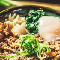 Yama Beef Bowl · Marinated beef with sweet onions in special sauce served with spinach, kimchee, sauteed cabb...