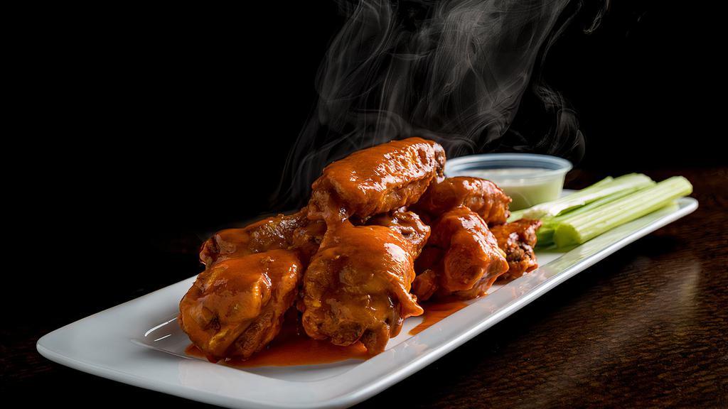 Buffalo Wings · Chicken wings tossed with our spicy Buffalo sauce, JACK DANIELS, BBQ sauce, sweet chili and Chipotle aioli sauce!