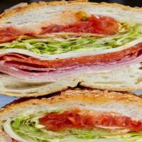 Daniel Sandwich · Ham, genoa salami baloney. White american cheese.