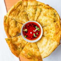 Scallion Pancakes · Savory folded flatbread.