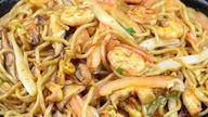 Shrimp Chow Mein · Served with fried noodles and white rice. Not a spaghetti dish.