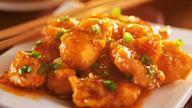 Orange Chicken · Hot and spicy. Slightly fried chunks of chicken in a heavily blended brown sauce. Served wit...
