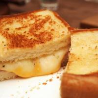 Old School Grilled Cheese · American cheese on buttery Texas toast.