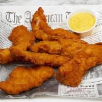 Chicken Tenders · Golden brown all-white-meat seasoned chicken strips served with honey mustard.