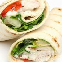 American Wrap · Delicious Wrap made with Hot turkey, roast beef, lettuce, tomatoes, cheddar, Swiss cheese, a...