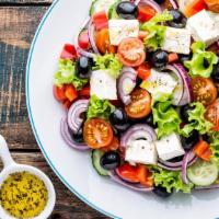 Greek Salad · Fresh Salad made with Romaine lettuce, tomatoes, bell peppers, onions, Kalamata olives, cucu...