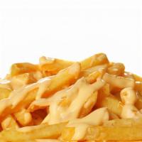 Cheese Fries · Golden-crispy fries salted to perfection, topped with melted cheese.